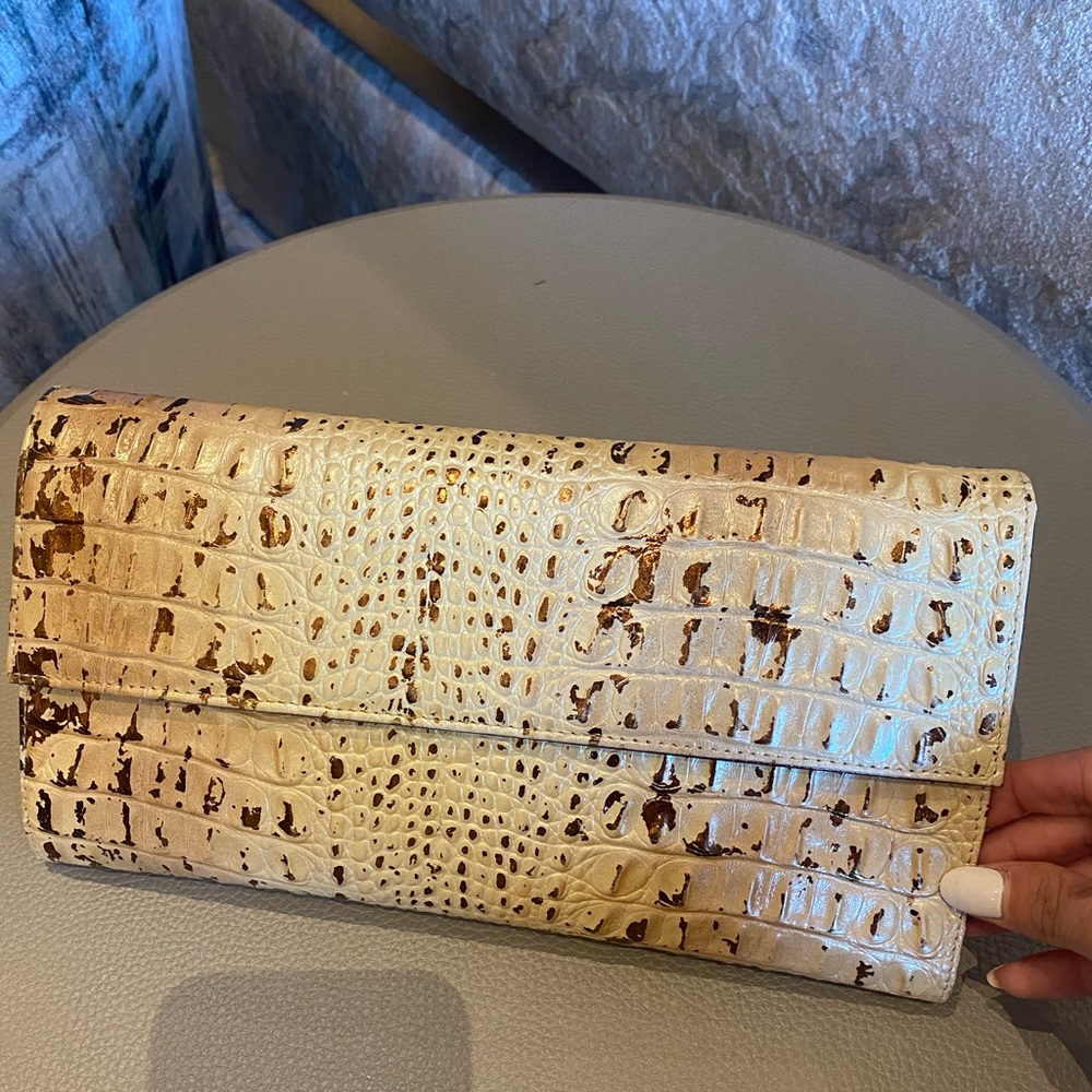 Tan and copper fashion clutch